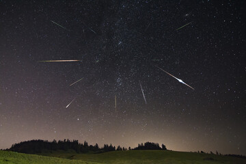 Perseid meteor shower with farm building