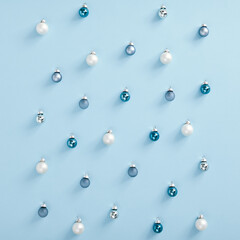 White and blue bauble on blue square
