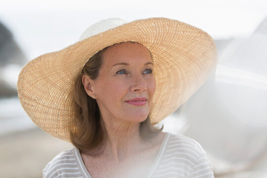 Beautiful senior woman in sun hat