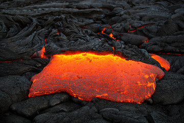  Kīlauea volcano's Pāhoehoe lava flow, Big island Hawaii. Lava is molten or partially molten rock...