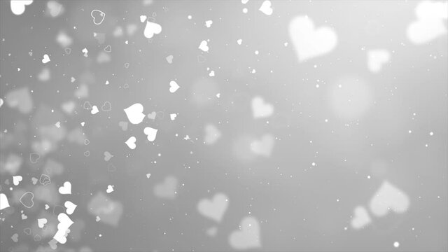 Abstract White Shiny Heart Shape Bokeh lights Glitter Defocused Particles Loop Background Animation. birthday, anniversary, celebration, Holiday, New Year, Party, event Celebrations, Invitation