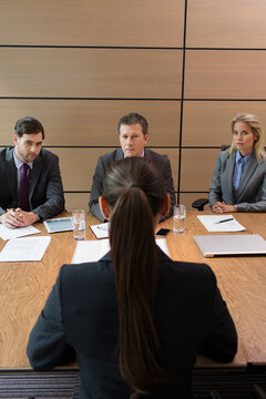 Businesswoman interviewing for job in conference room