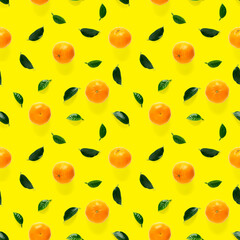 Mandarine seamless pattern, tangerine, clementine isolated on yellow background with green leaves. Collection of fine seamless patterns.