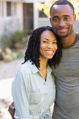 Obraz premium Portrait happy young couple on patio