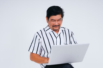 Senior man in white collar shirt using laptop computer isolate on white background.