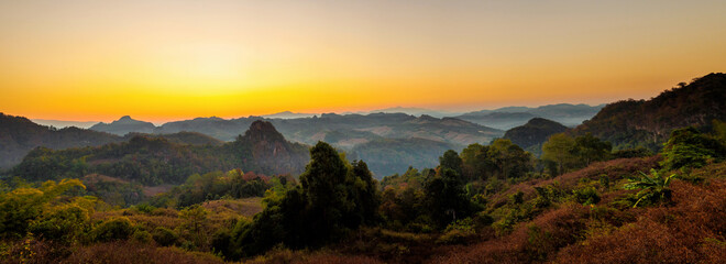 Panoramic view of beautiful sunrise over mountain landscape in Mae Hong Son , Thailand.