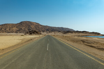 Desert road in remote rural area of Tabuk in north western Saudi Arabia