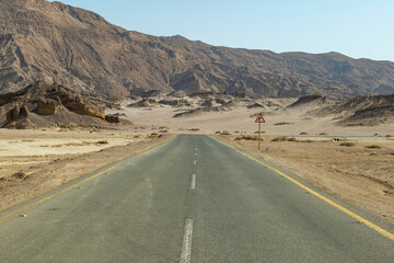 Desert road in remote rural area of Tabuk in north western Saudi Arabia