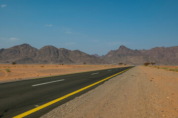 Desert road in remote rural area of Tabuk in north western Saudi Arabia