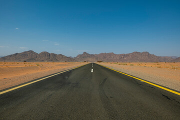 Desert road in remote rural area of Tabuk in north western Saudi Arabia