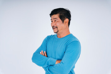 Senior man in blue long sleeve shirt cross arms gesture isolate on white background.