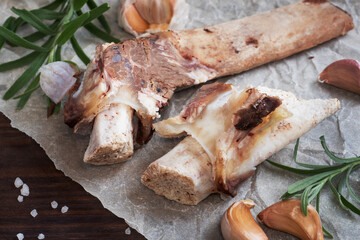 Beef bone and vegetable ingredients for cooking broth. Healthy food with collagen and amino acids. Copy space.