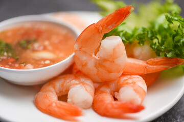 Shrimp delicious seasoning spices on white plate appetizing cooked boiled shrimps prawns , salad shelfish seafood sauce /