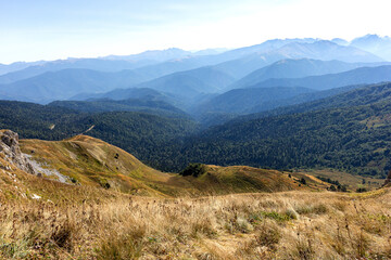 Panorama of mountains in autumn ,a place of rest and travel in the bosom of nature in the mountainous area of subalpine meadows.