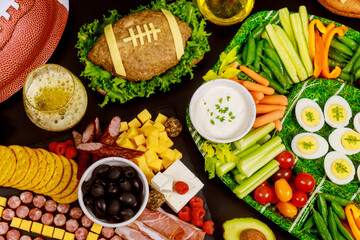 Healthy vegetable platter with meatloaf like a football ball for american football game party. Close up.