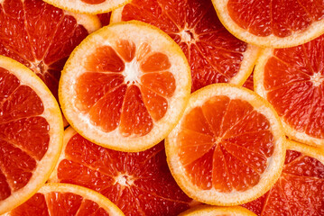 Background of slices of grapefruit close up