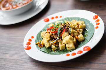 Tahu Cabe Garam is Indonesian traditional food, made from tofu and a lot of chilli. Spicy food lover will love this.