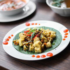 Tahu Cabe Garam is Indonesian traditional food, made from tofu and a lot of chilli. Spicy food lover will love this.