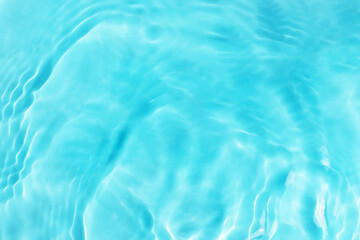 Fototapeta na wymiar Transparent blue water with shadows, natural creative background.