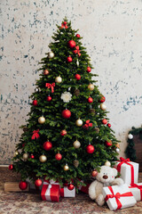 Fototapeta na wymiar Christmas tree with gifts new year pine decor