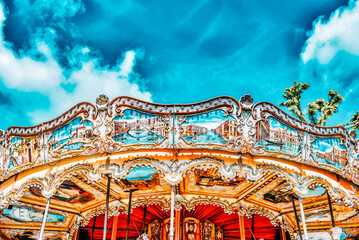 Entertainment Carousel for the youngest children. Horses on a carnival.
