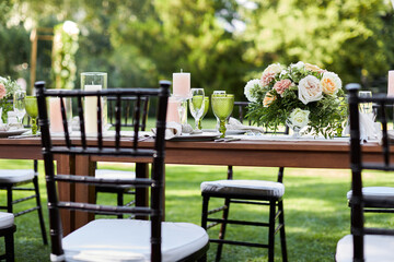 dinner tables with white cloth, served with porcelain and green glasses. Georgeous wedding table...