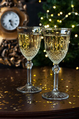 Two champagne glasses ready to celebrate in  New Year