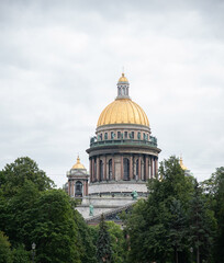 Fototapeta na wymiar Saint-Petersburg, Russia. Saint Isaac's Cathedral on background of cloudy sky in summer season.