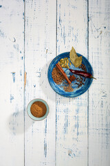 Colorful specials on the table. Indian Garam masala powder and it's ingredients colourful spices.