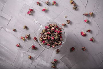 dry rosebuds for tea are on the table