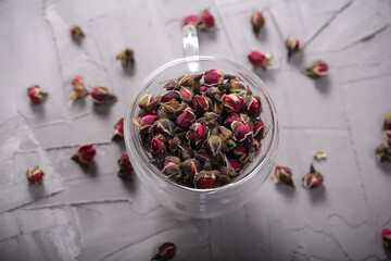 dry rosebuds for tea are on the table