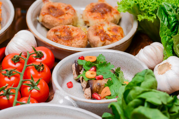 Presentation of georgian cuisine. Baked mushrooms with suluguni cheese, Tbilisi Caesar, caprese, lavash bread, Pkhali.
