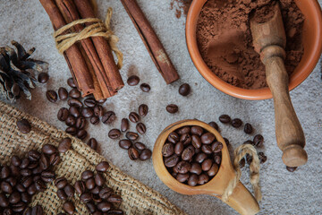 composition of coffee beans, shecolade, cinnamon and cocoa