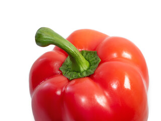 top of red fresh and juicy bell pepper on a white background