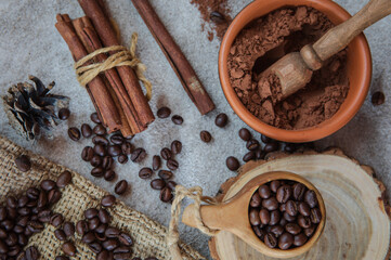 composition of coffee beans, shecolade, cinnamon and cocoa