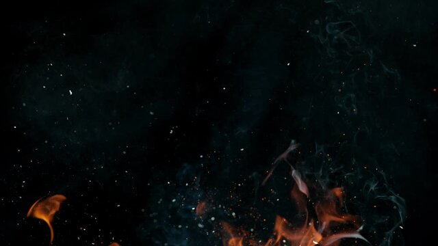 Fire flames and sparks in super slow motion isolated on black, shooting with high speed cinema camera at 4K