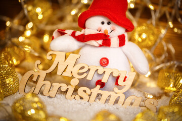 Happy Christmas is a toy in the garlands, with the wooden words.Winter holidays for children