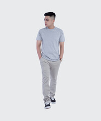 Young handsome man was posing wearing heather grey t-shirt short sleeve with mockup concept