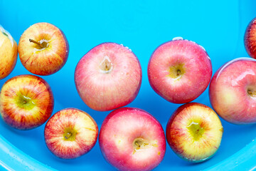 Washing fresh apples in the water