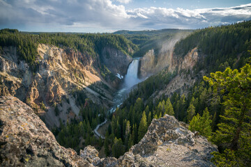 lower falls of the yellowstone national park at sunset, wyoming, usa