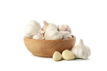 Wooden bowl with garlic isolated on white background