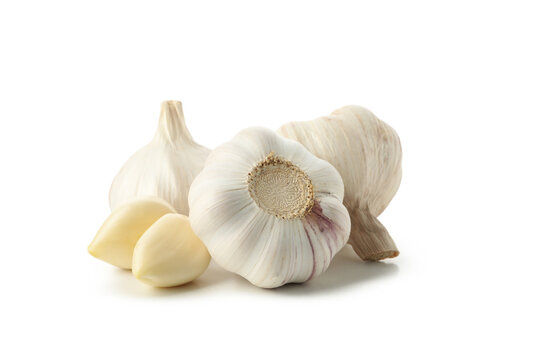 Raw fresh garlic isolated on white background