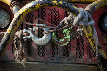 Hook of a winch on a dirty off road vehicle © bizoo_n