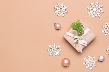 Christmas composition with gift on color background