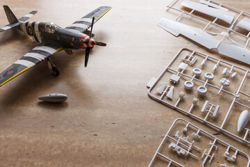 Scale model of the airplane fighter with details. Plastic assembly kit