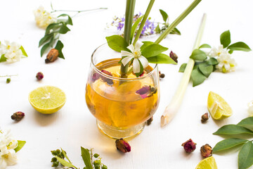 natural herbal healthy drink for cough sore mix rose tea ,lemon arrangement flat lay style with...