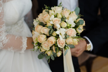 bride holding bouquet, bride and groom, bridal bouquet of white roses