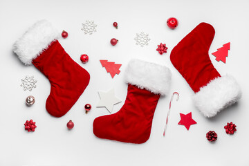 Composition with Christmas socks on white background