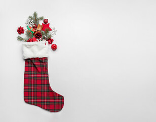 Christmas sock with decor on white background