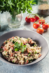 Spaetzle with fried bacon and onion